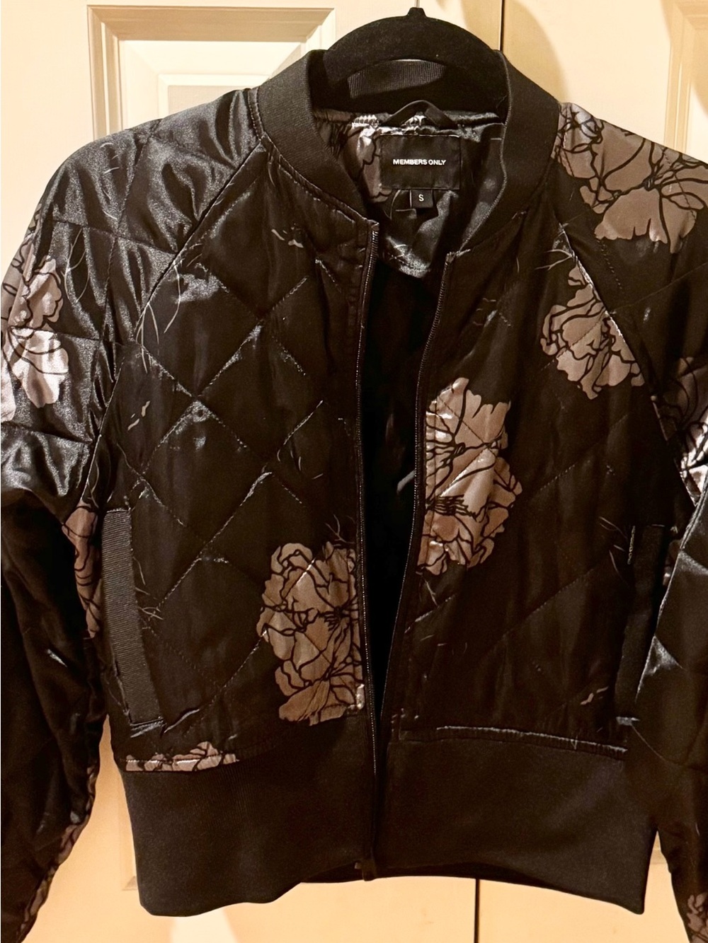 Members Only brand black floral silk satin bomber jacket with quilting detail